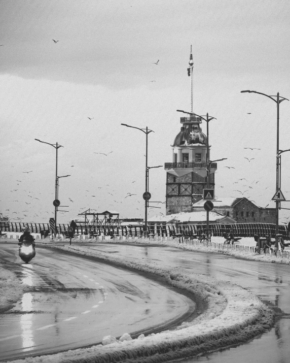 a black and white po with lots of old street lamps