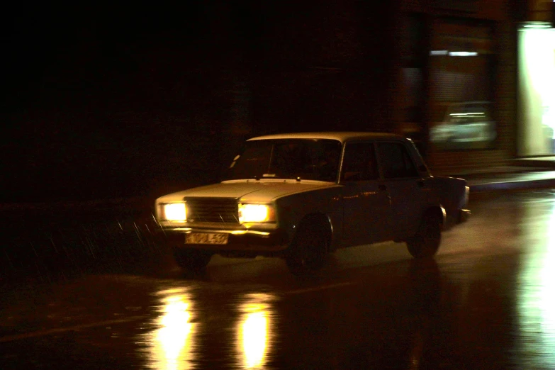 a light on a car driving down the road