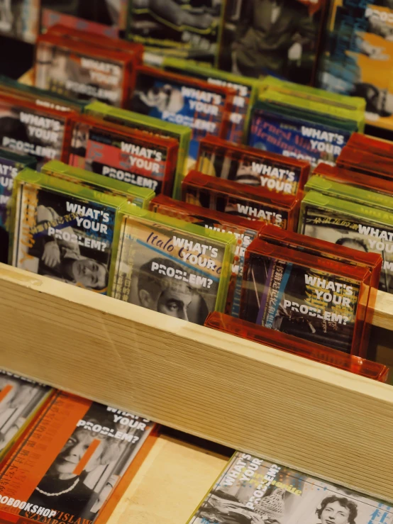 several books are on display with an assortment of them