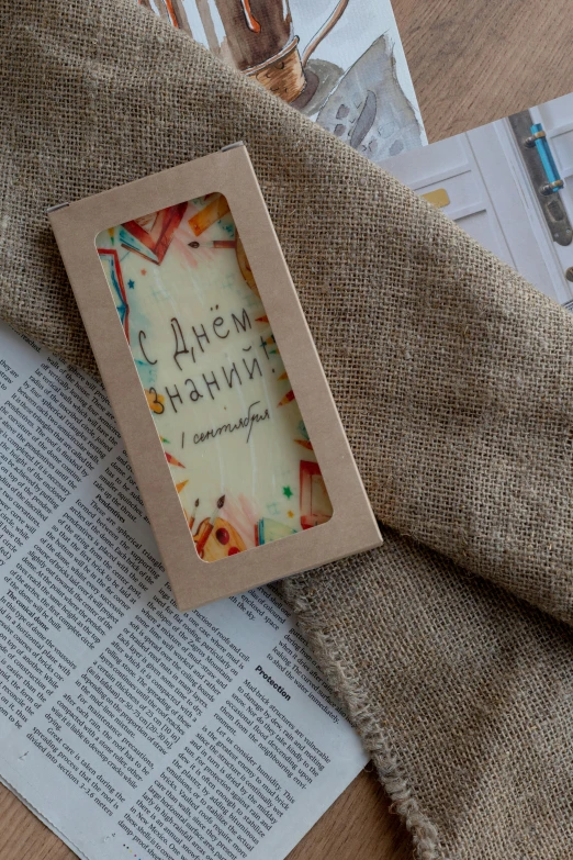 a book with writing on it near a desk