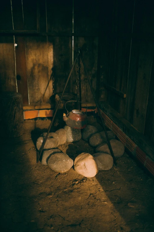 a bunch of logs stacked together in a wooden structure