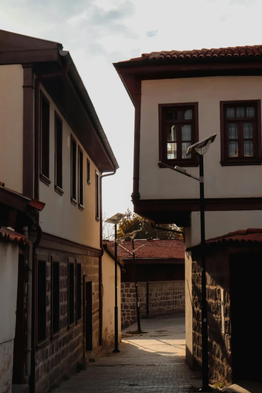 a street view looking at an old brick building