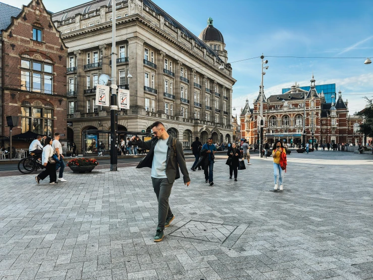 people in an area with lots of buildings