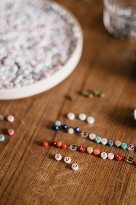 a few ons and a small bead bead are arranged neatly on a table