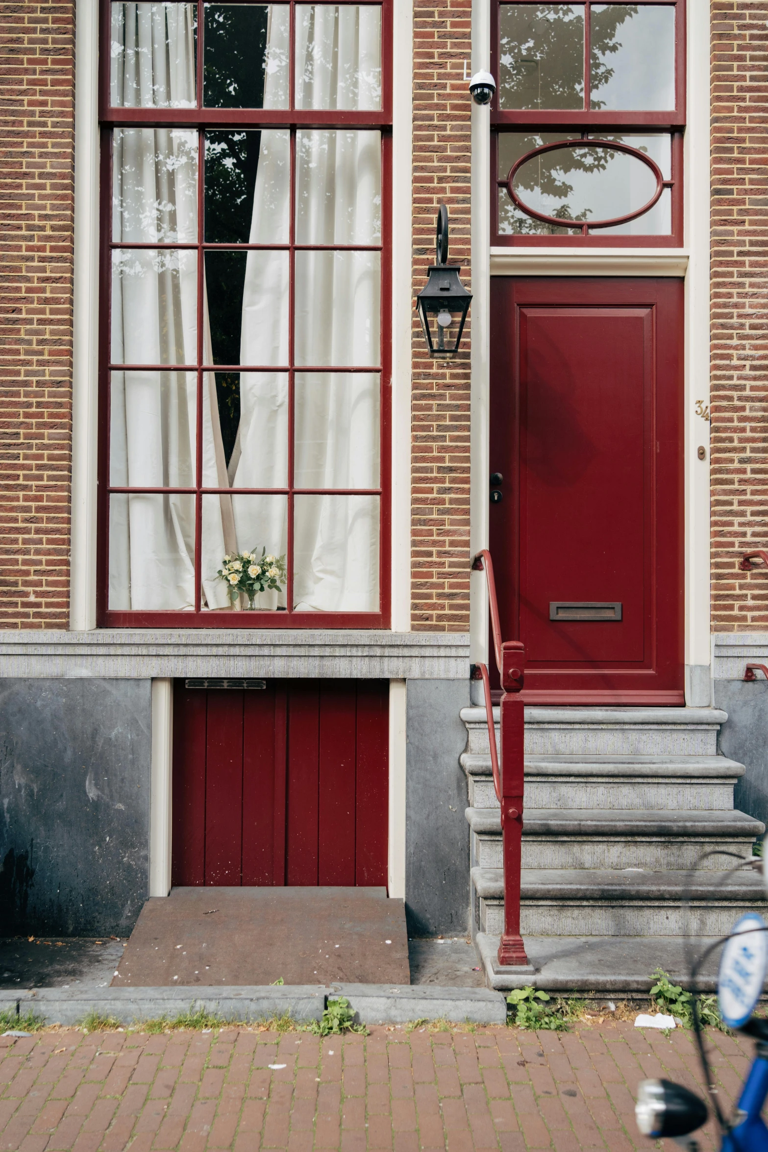 two doors with a red frame on each side