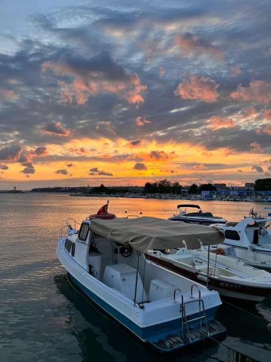 several boats parked at the dock in a harbor