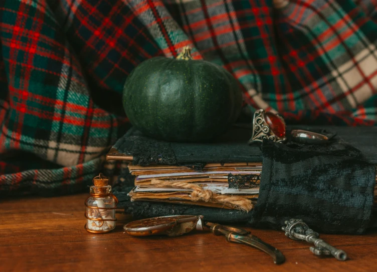 an arrangement of old items sits atop the table