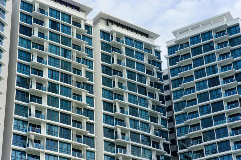 tall buildings line the side of the street