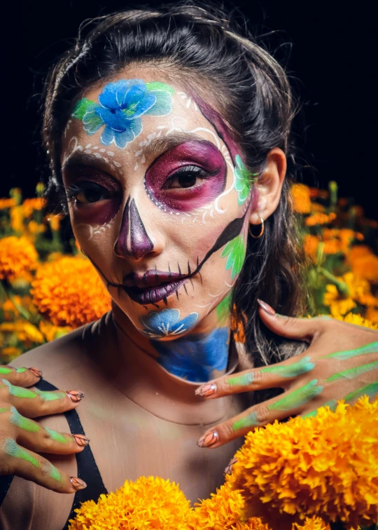 a  is covered in flowers and painted body art