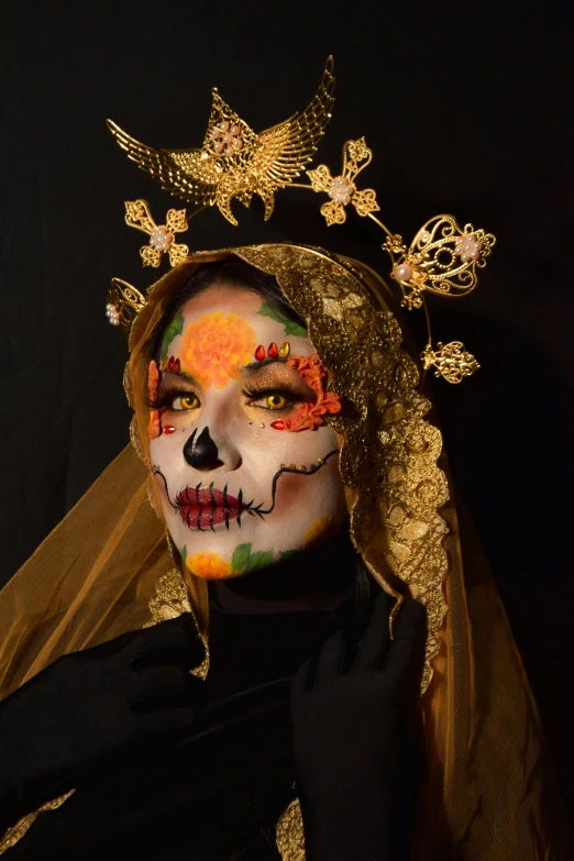 a woman with face paint decorated with stars and crosses