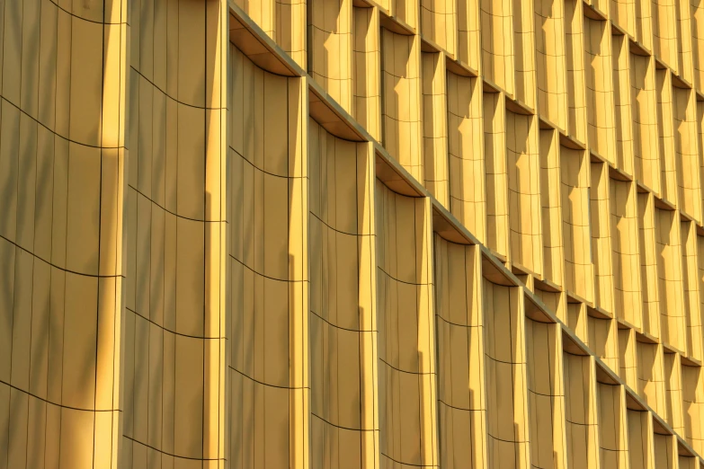 this large yellow building is made with wood strips