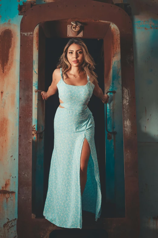 a woman standing in a doorway of an abandoned building