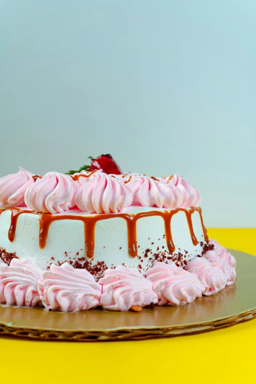 an image of a dessert covered in pink frosting