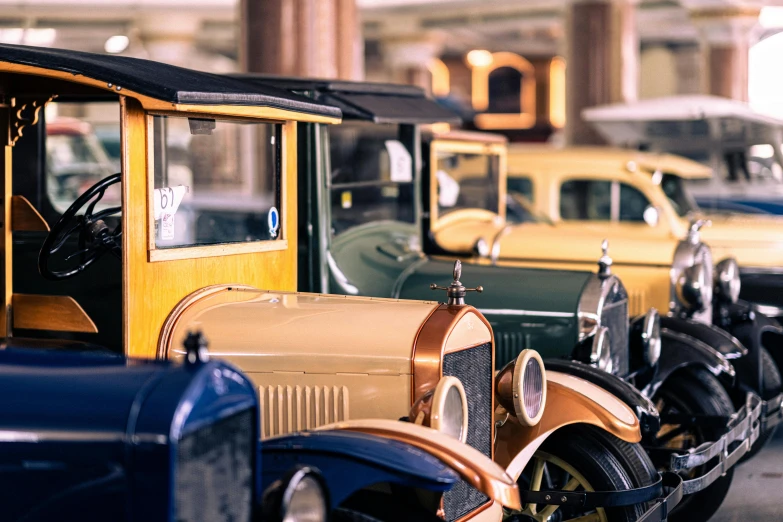 an old model - t car line up at a classic automobile show