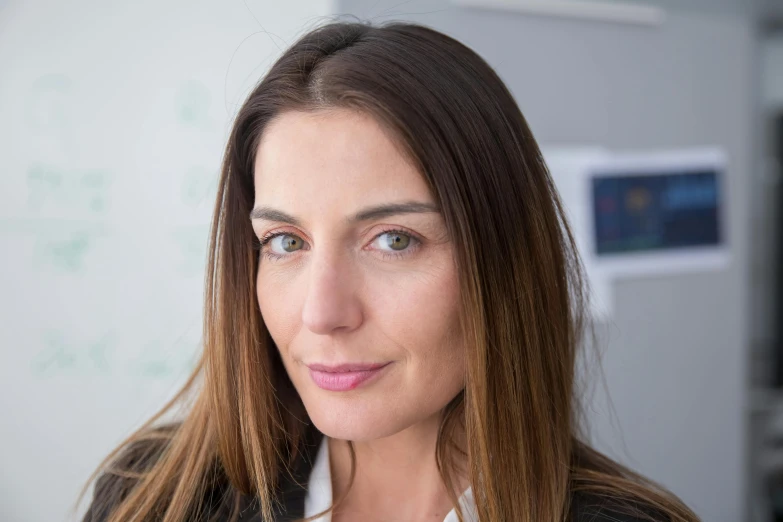 a women who is posing for the camera