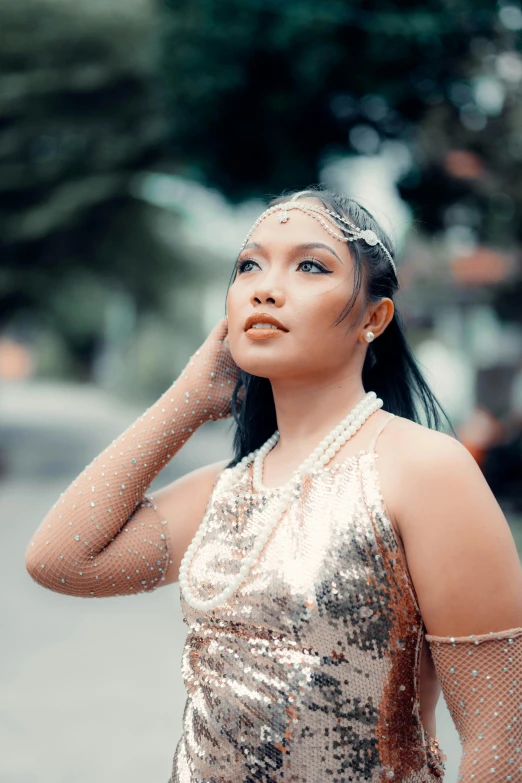 an image of a woman with sequins on her face