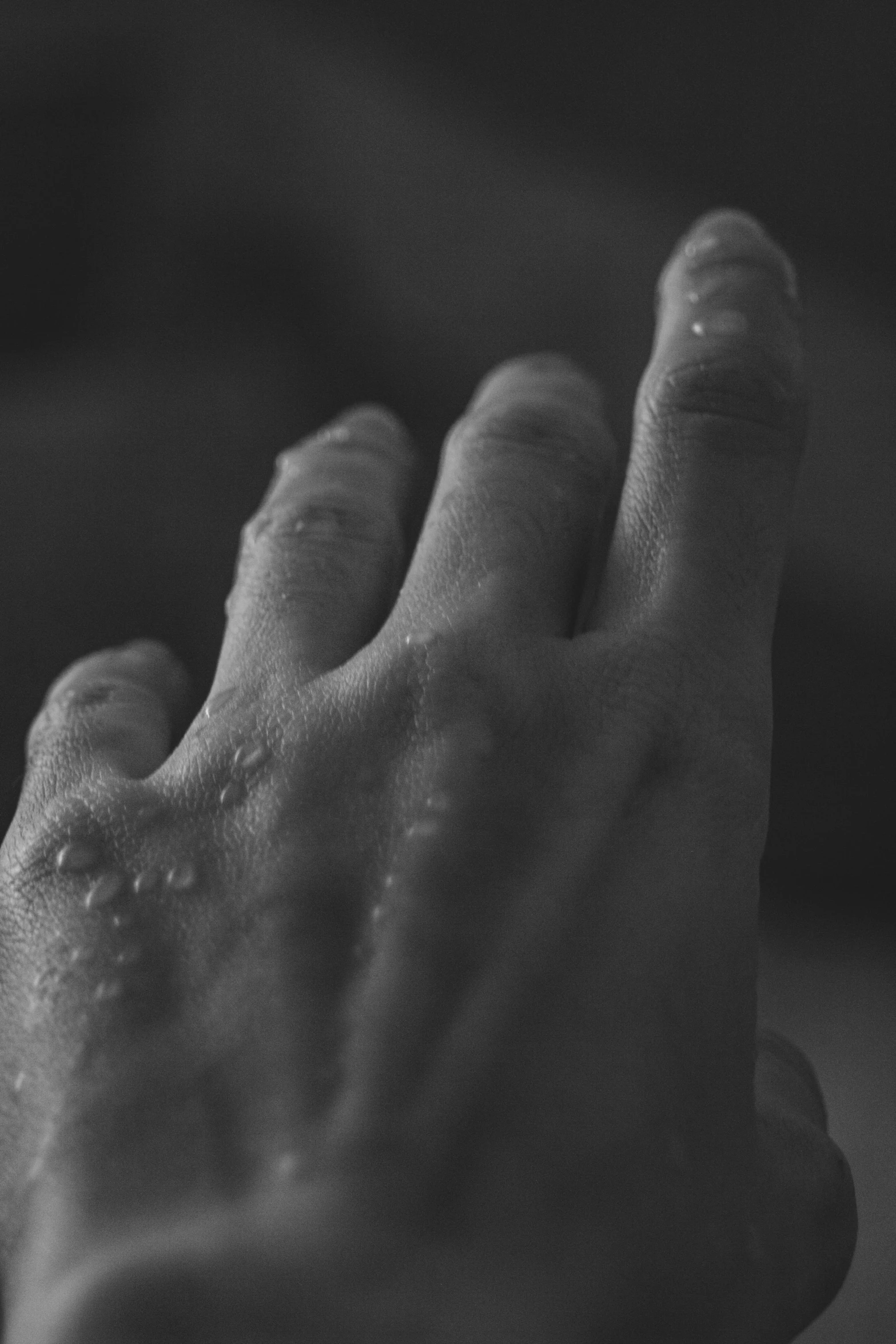 a persons hand with a lot of marks on it