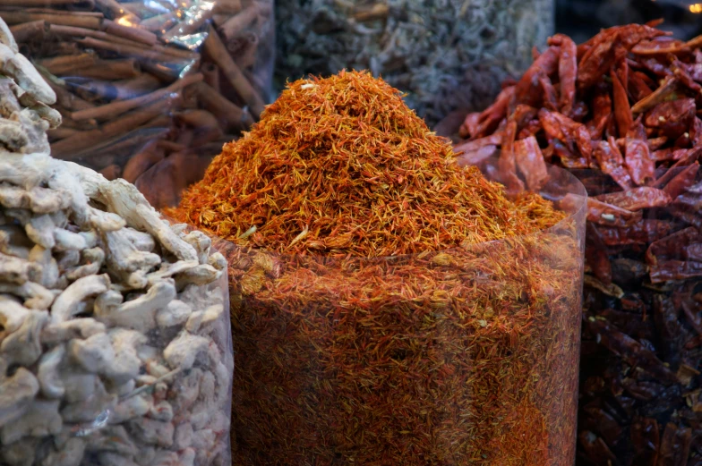 a group of herbs are on top of a bag