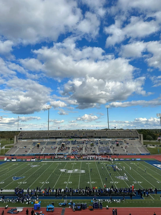 an empty football stadium filled with people