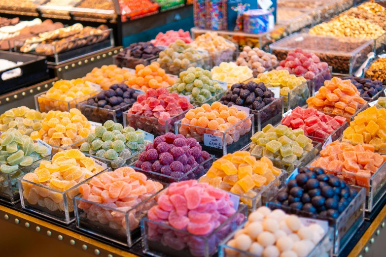 assorted candy for sale in a market stall
