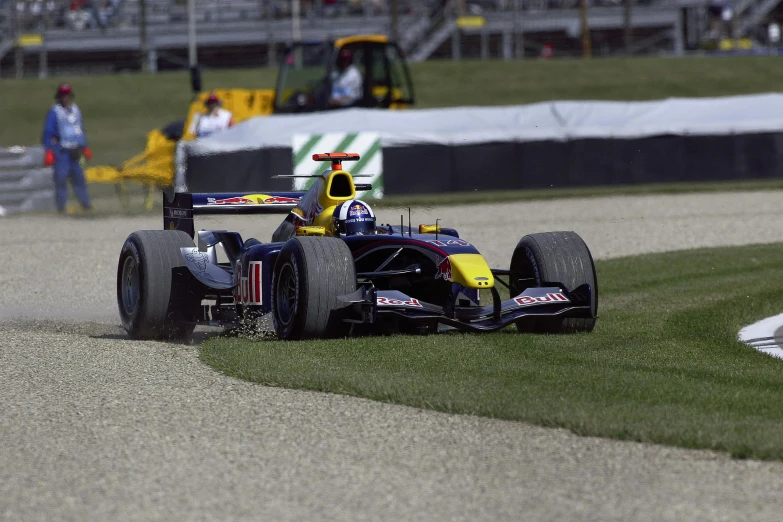 a racing car going around a bend during the race