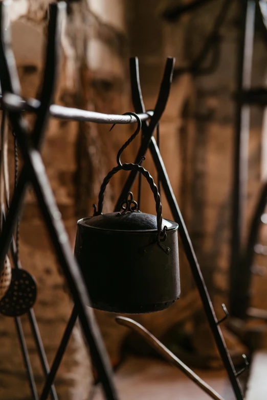 a small bell hanging from the side of a bike