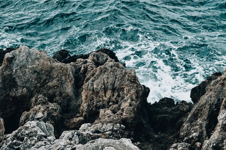 rocks at the edge of a body of water