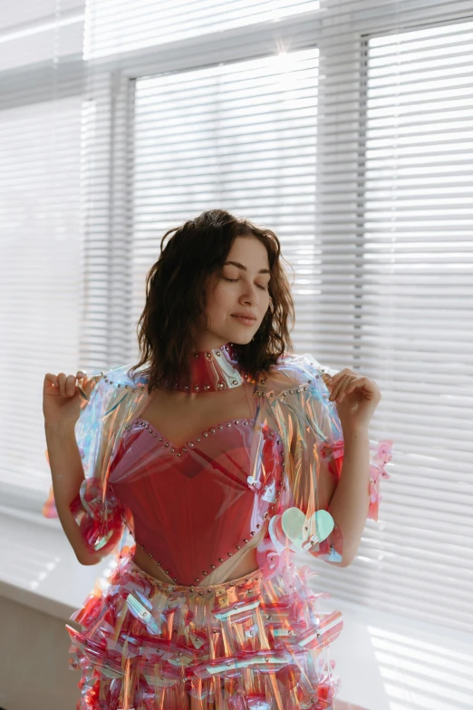 woman wearing colorful clothes holding up her dress