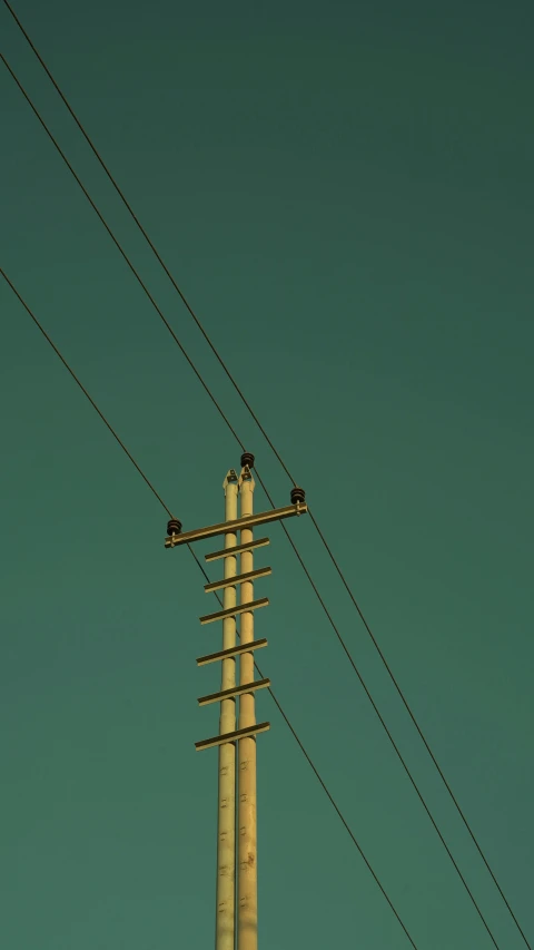 the pole of an electric line with four wires