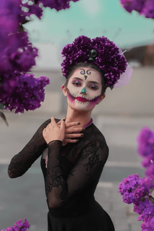 a woman with makeup that is wearing clown makeup