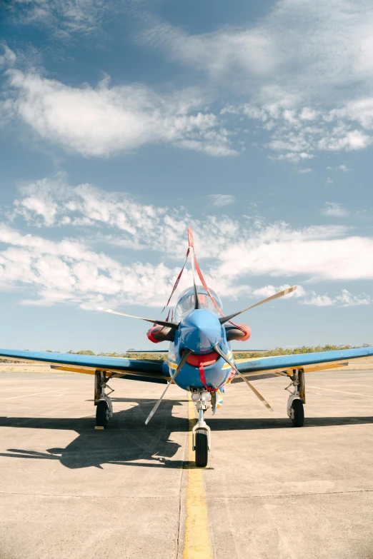 a plane parked in the middle of a road