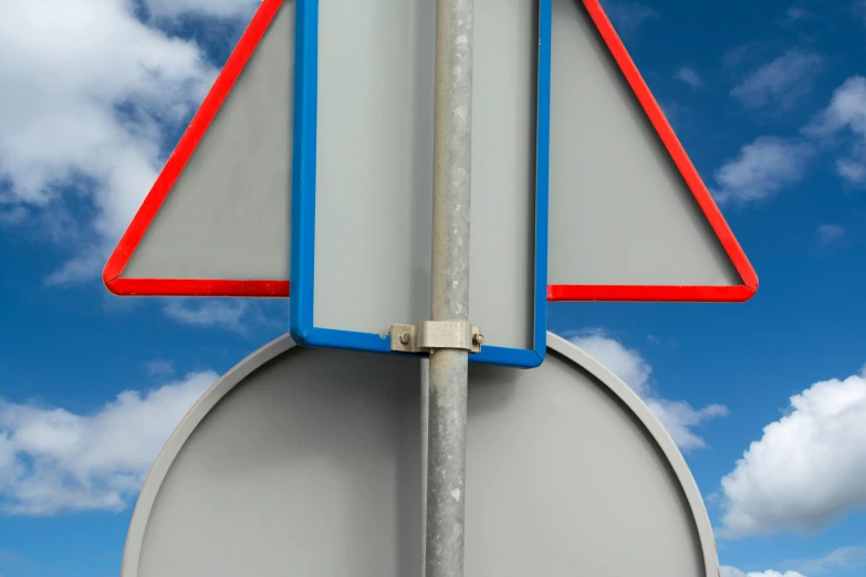 a pole that has a red triangle around it