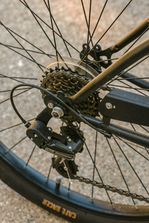 the spokes on a bicycle are exposed by chain and axle