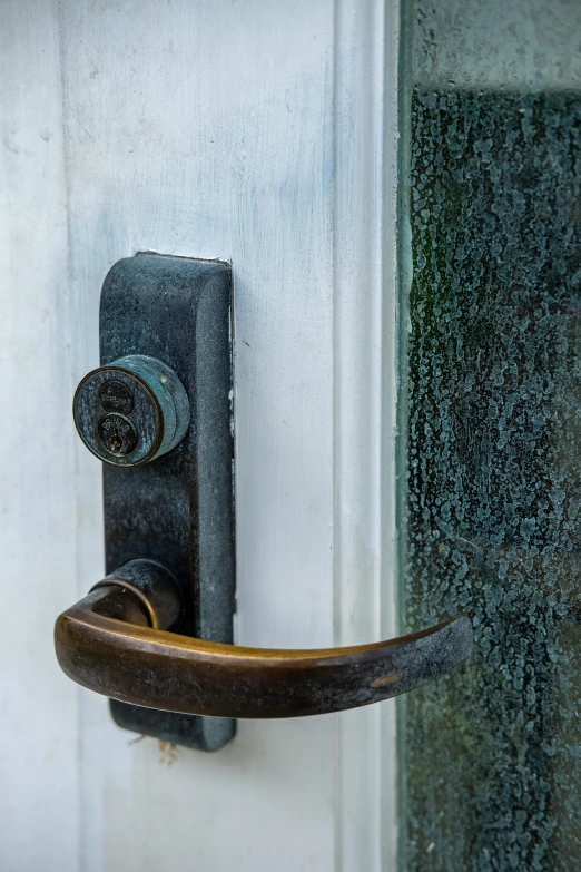 the door handle on an open white door