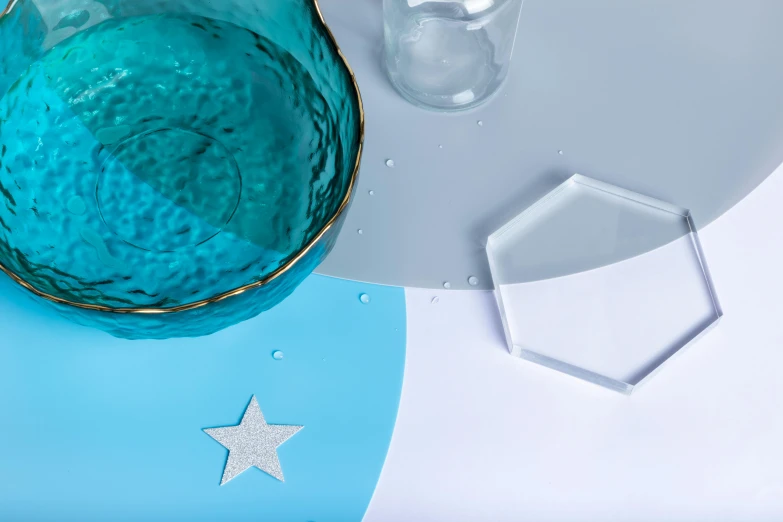 a star decoration with star shaped ice bucket next to it