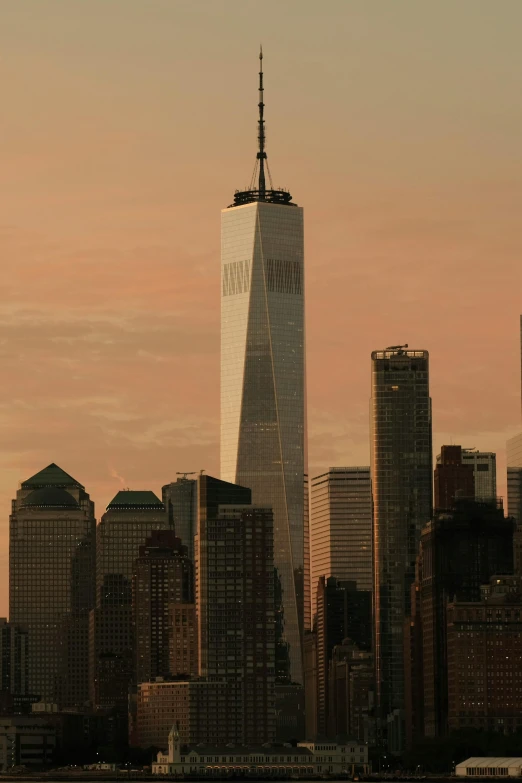 one world trade center at sunset in new york city