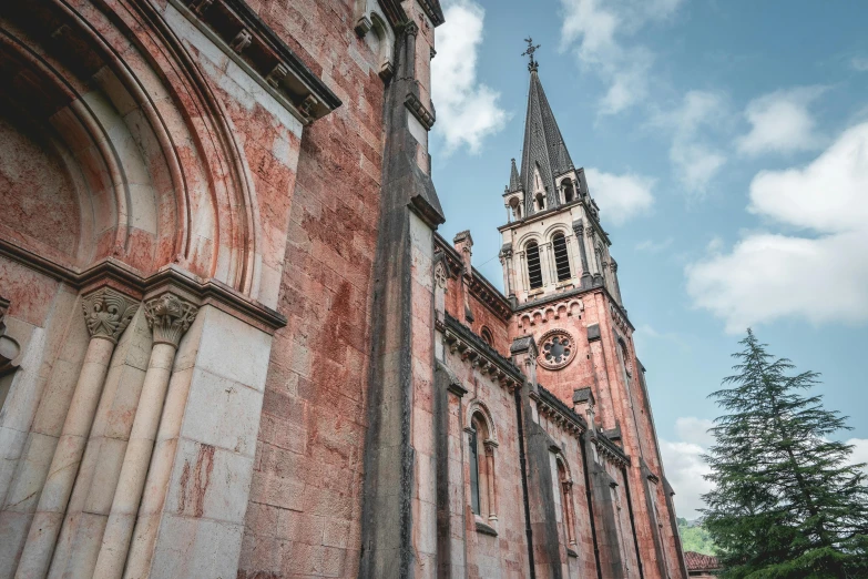 a large cathedral with a clock on the side