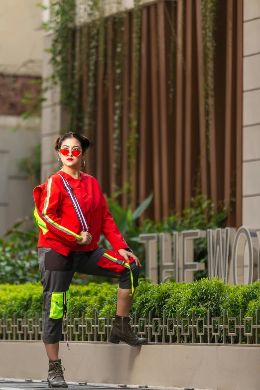 a woman on rollerblades riding through an intersection