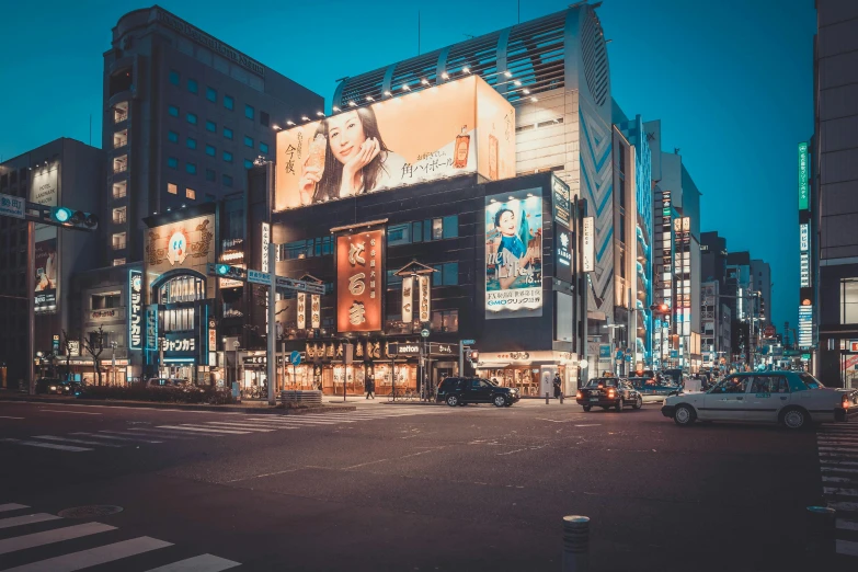 a large group of city buildings on the street at night