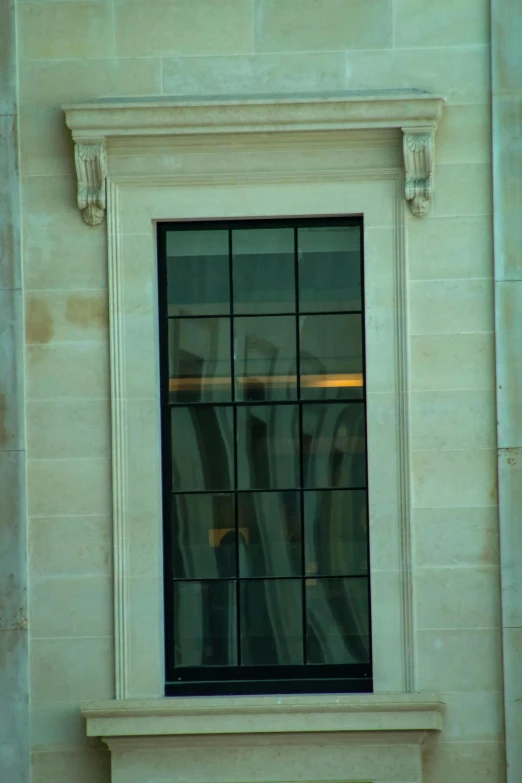 a stone building has a clock on it