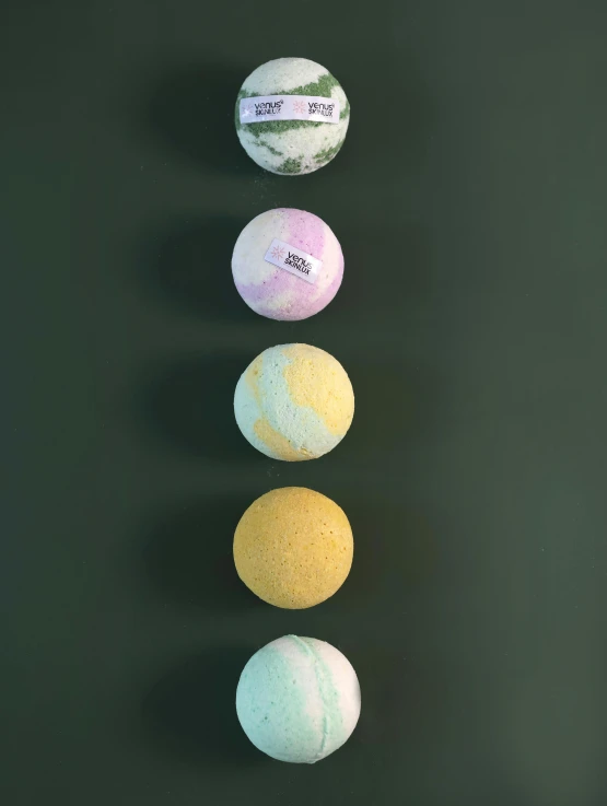 four bath bombs in the shape of three different shapes