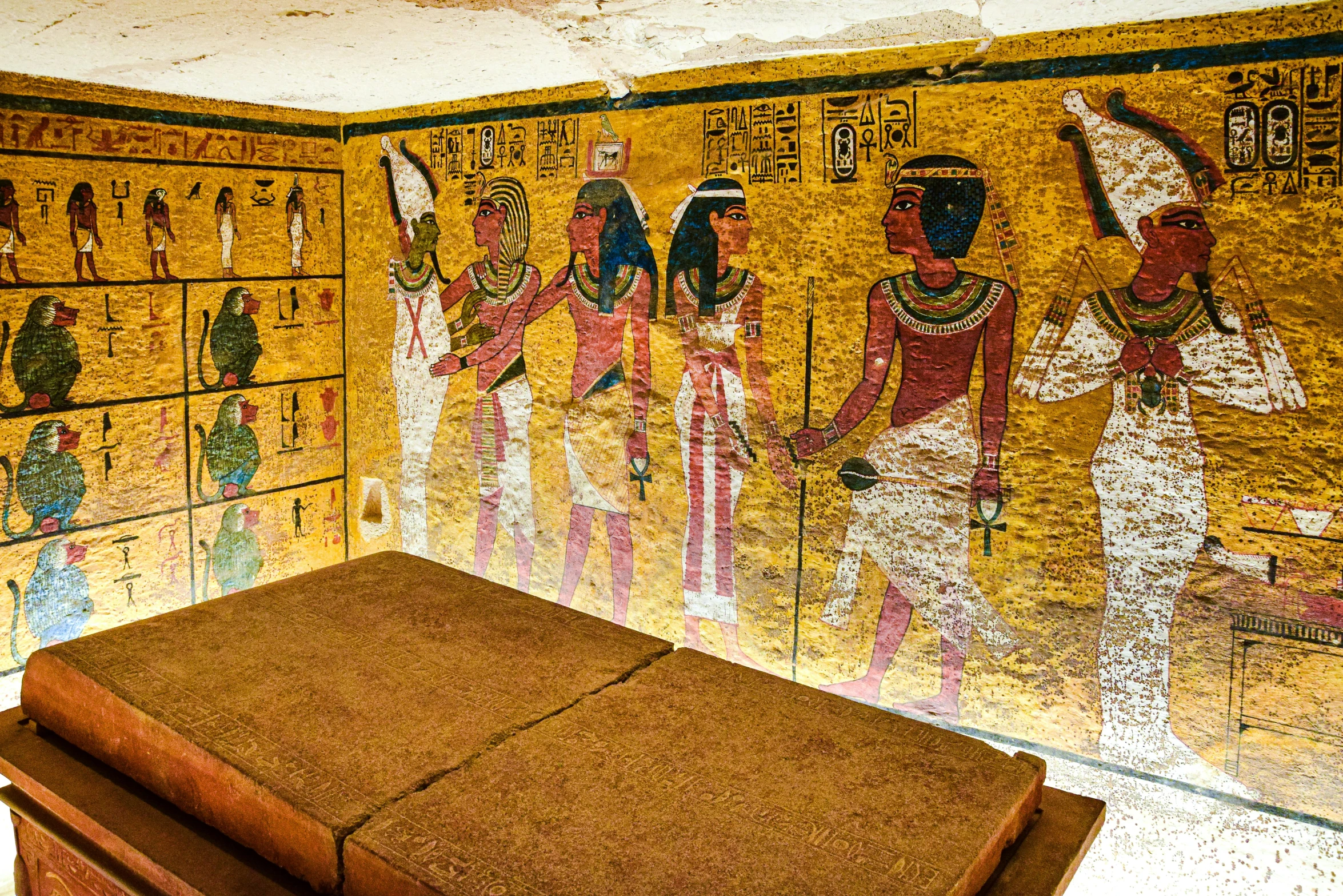 a room with paintings of ancient egyptian and native americans