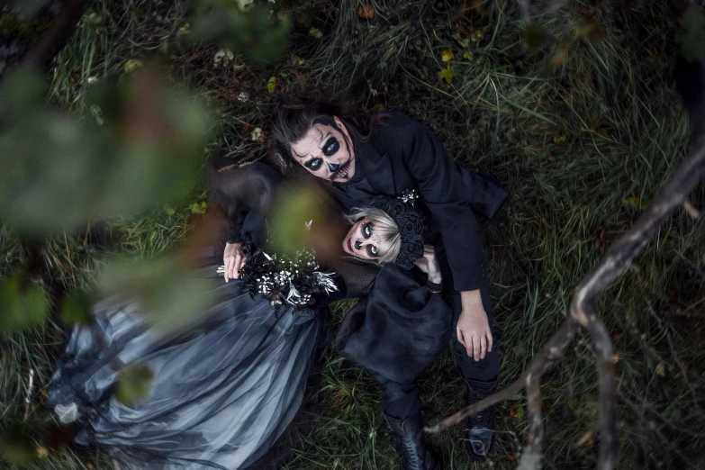 an overhead s of a bride and groom in their wedding attire