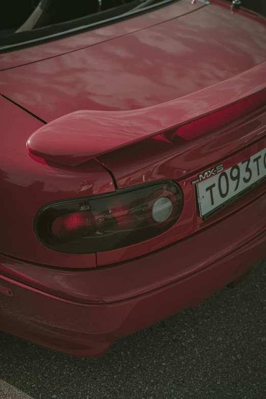 the front view of a red car with it's hood open