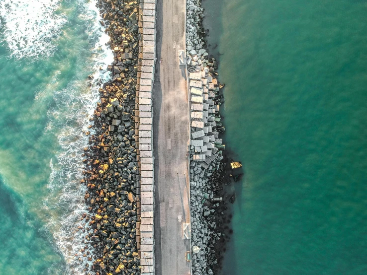 an aerial view of a beach in the water