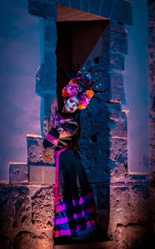 a halloween image featuring a female skeleton with flowers and an evil face