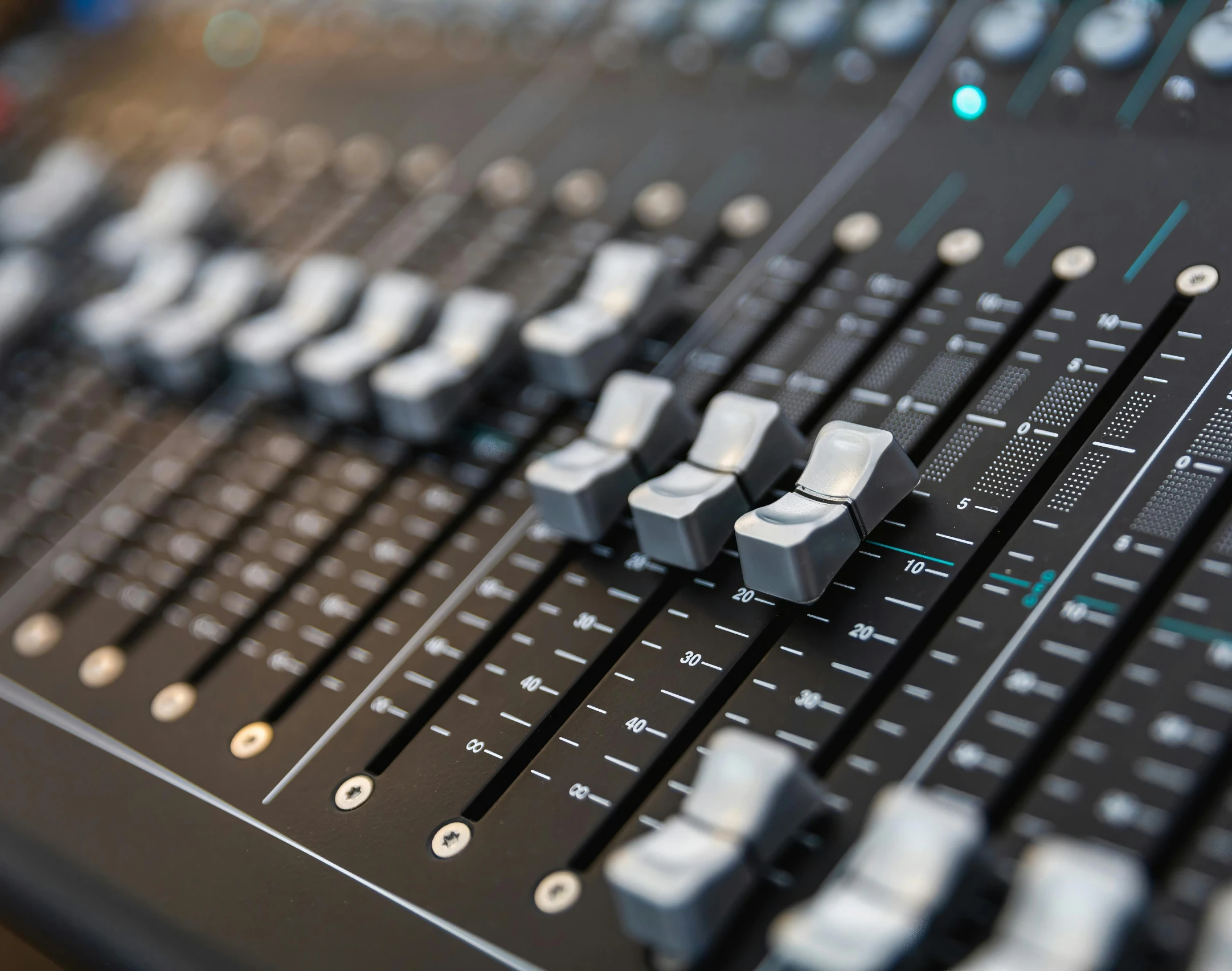 the side view of a sound mixing console