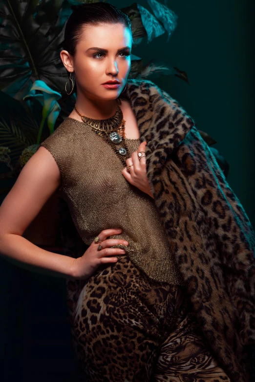 woman in leopard print dress with an animal fur scarf over her shoulders