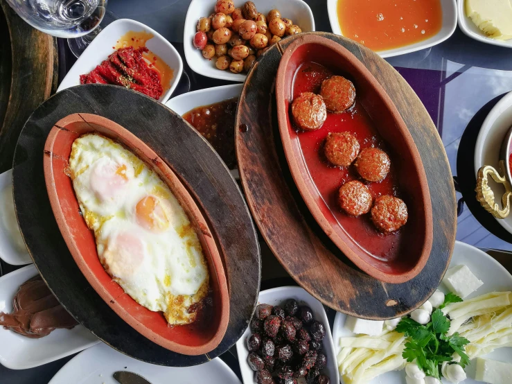 the assortment of food on the plates are displayed