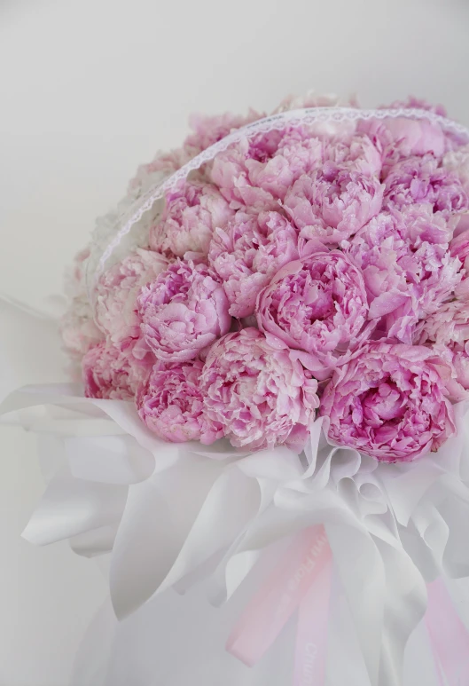 some pink flowers inside a clear plastic bag